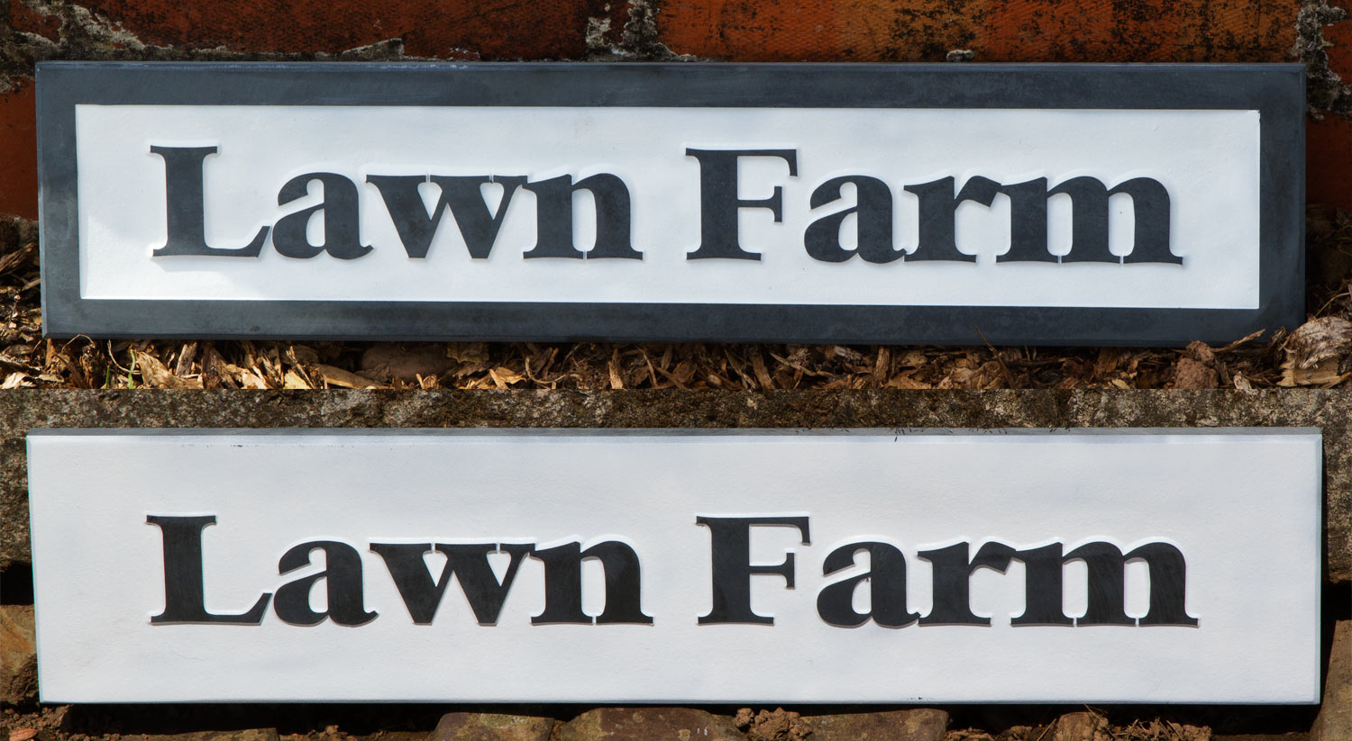 http://www.sign-maker.net/stone/slate-house-signs.html