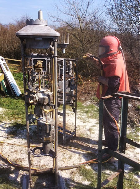 Sand blasting vintage petrol pump