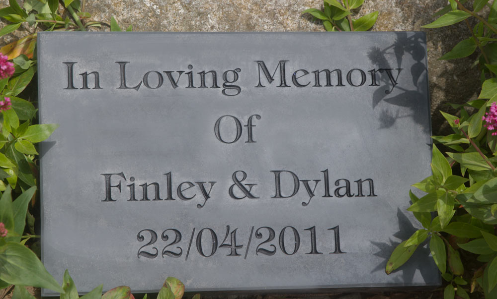 Slate memorial with black letters