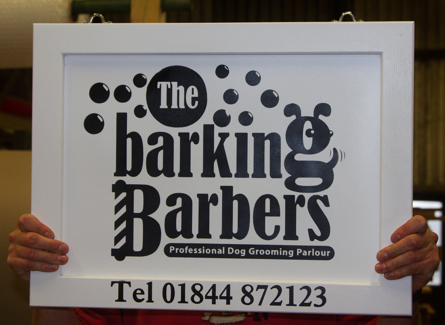 Painted wooden framed signs