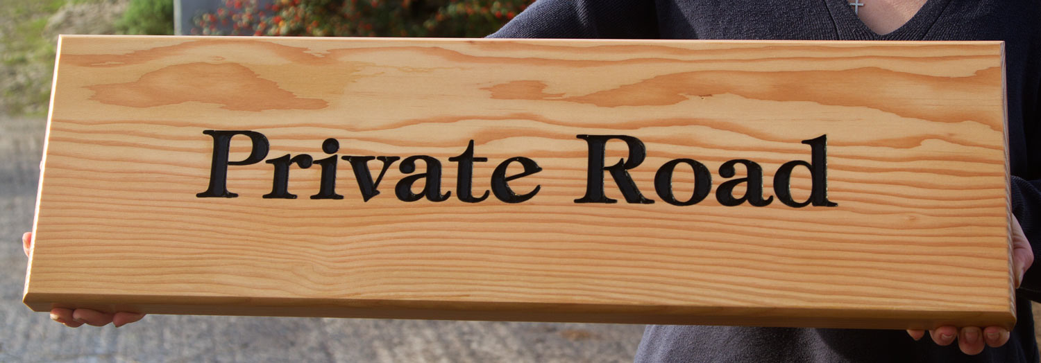 Low maintenance wooden signs
