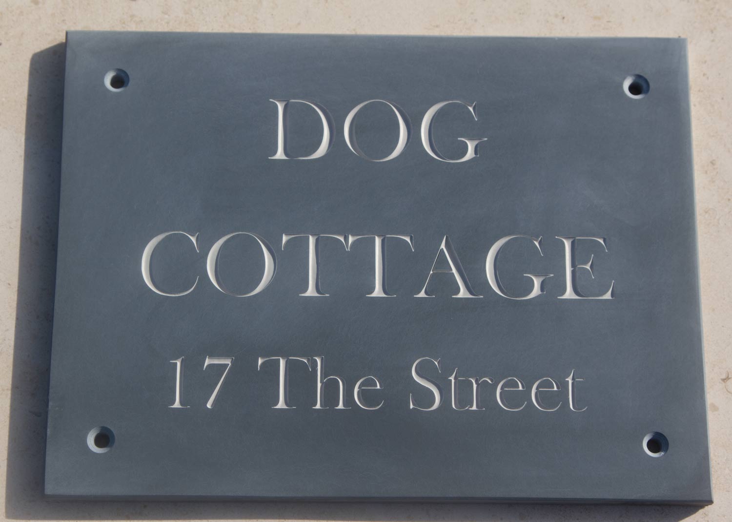 Slate sign with grey letters