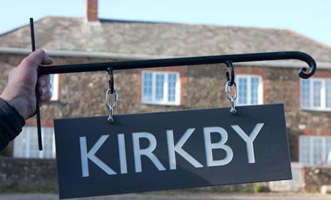 hanging-corian-housesign