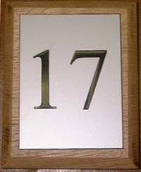 wooden sign with plaque