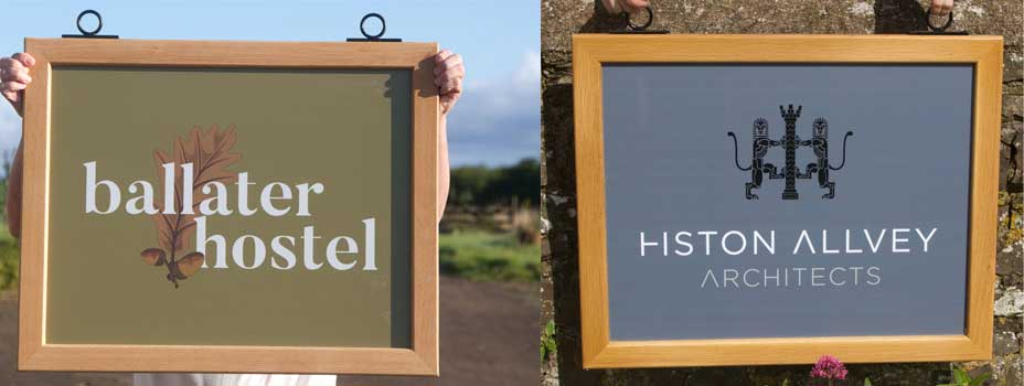 Framed hanging signs with printed vinyl boards.